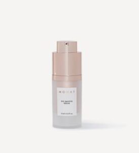 flask eye smooth serum from monat on white surface with shadow