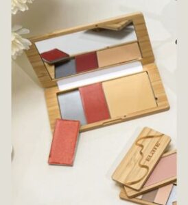 elate beauty new refilable capsule palette with few colors opened on a white table