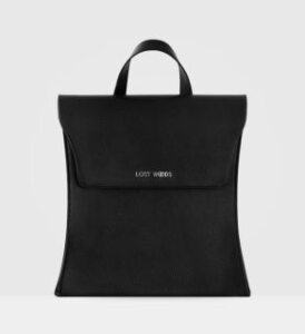 lost woods modern birch backpack in Black and silver on grey background presented by veganlyy