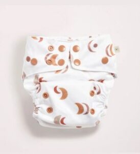 veganlyy econaps desert moon 2.0 modern cloth nappy brown and white on a surface