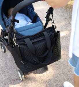 veganlyy ASK Scandinavia's Black Changing Tote Bag attached on baby stroller buggy