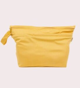 veganlyy econaps modern vegan coth nappies sunflower yellow big wet bag for babies seen in front
