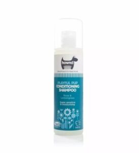 bottle of hownd playful pup organic natural condition dog shampoo on white background by veganlyy