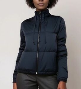 veganlyy presenting the will's vegan store dark blue women's recycled hooded puffer winter jacket worn by black woman